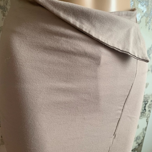 TAN SKIRT WITH ASYMMETRICAL DETAILING ** small tear in back ** - Picture 3 of 7